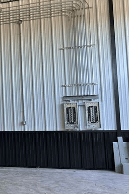 Conduit and panel work on a commercial building